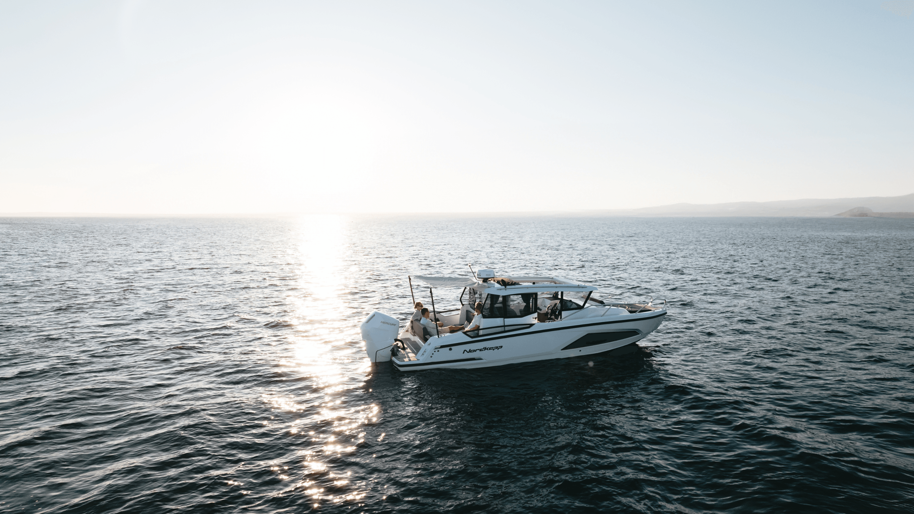 About Helios Marine - People on boat in UAE waters