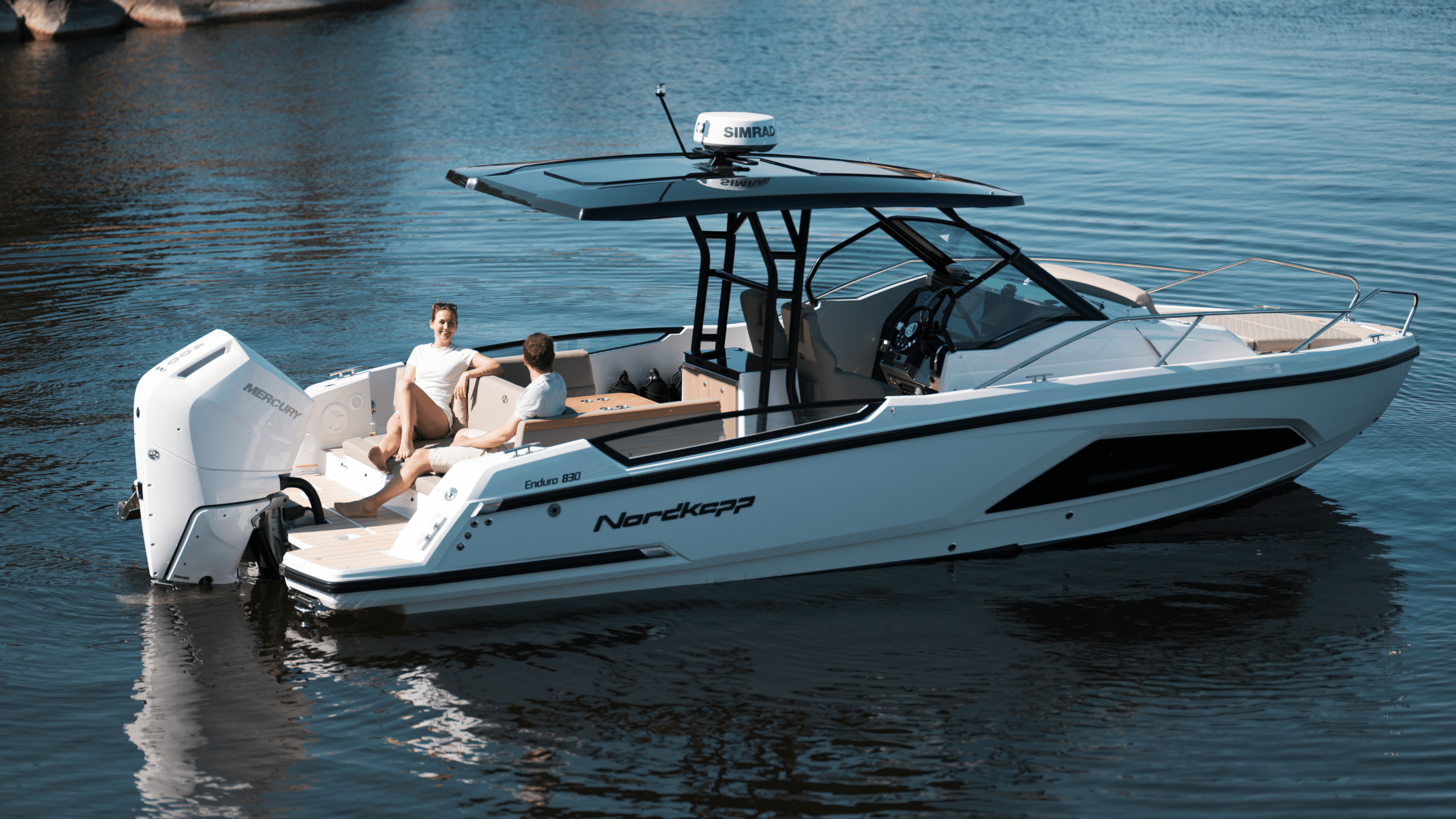 Nordkapp boat on water with people enjoying